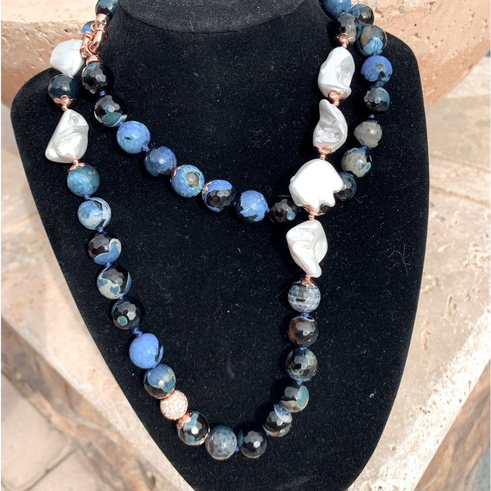 32” Lapis Baroque necklace with rose gold colored findings. Single knotted